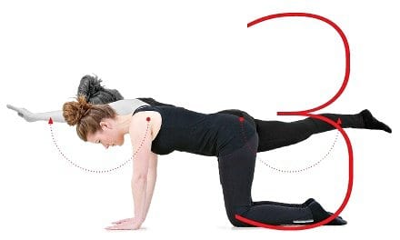 woman performing back stregther exercise